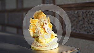 Eco friendly Ganesh or Ganpati idol or murti, home made. selective focus. Ganesha chaturthi festival 2022