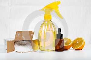 Eco-friendly natural cleaners made of lemon and baking soda on w