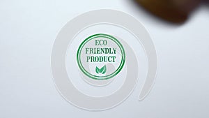 Eco Friendly Product seal stamped on blank paper background, organic products