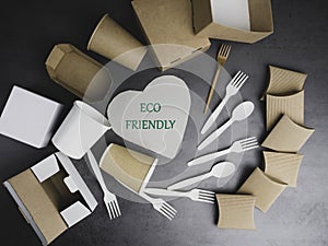 Eco friendly recycling paper packing for fast food on grey background. Cups, containers, box, table cutlery