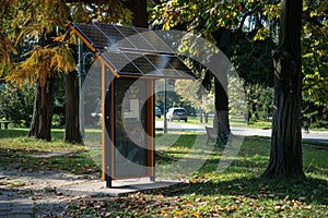 Eco-friendly solar-powered charging station in a lush park