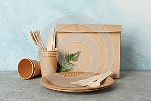 Eco - friendly tableware on grey table