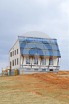Eco-house with solar panels photo