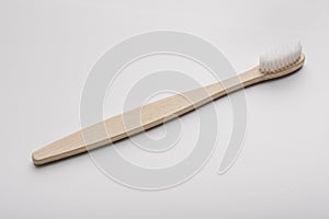 Eco natural bamboo toothbrush on white background