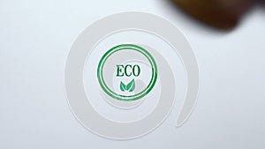 Eco seal stamped on blank paper background, organic food and goods, lifestyle