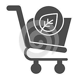 Eco shopping glyph icon. Ecology market trolley with leaf button. Commerce vector design concept, solid style pictogram