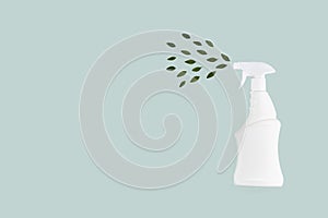 Eco spray bottle for safe cleaning with green leaves