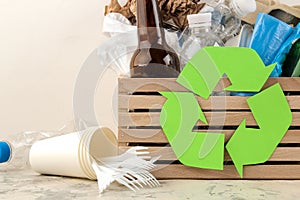 Eco symbol and trash in the box. recycling. waste recycling. on a light background