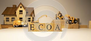 ECOA was created from wooden cubes. Finance and Banking.