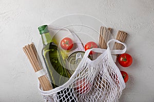 Ecobag with a grocery set. White string bag, shopper.