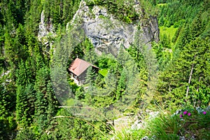 Ecolog mountain hut as seen from high above on the `Astragalus` via ferrata route, a popular sport attraction in Bicaz Gorge