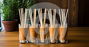 Ecological bamboo cocktail tubes for lemonades and drinks. Concept: Safe eco-friendly tableware without harm to the planet