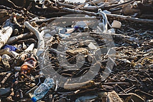Ecological concept. Ecology problems of the planet Earth. Rubbish in places of rest by the sea. Plastic bottles among