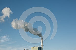 Ecological concept image.blue sky and chemical plant