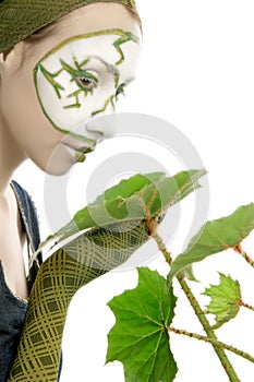 Ecological concept woman with green plant photo