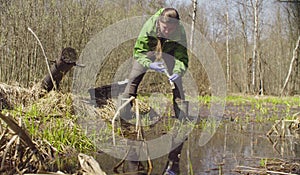 Ecologist getting samples of the water