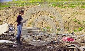 Ecologist during the research on garbage dump.