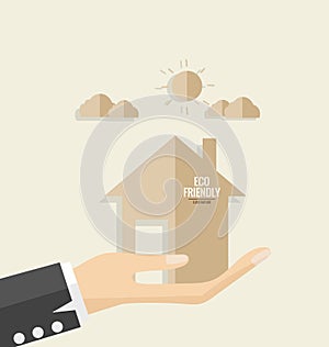 Ecology concept. Paper cut of House on hand. Vector illustration