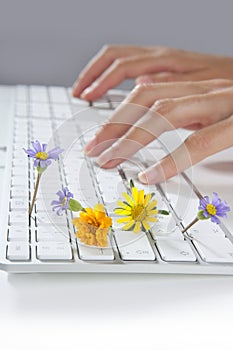 Ecology concept of woman hands typing keyboard