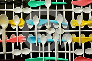 Ecology conceptual photography with plastic cutlery on a black background