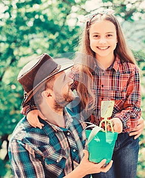 Ecology environment. soils and fertilizers. little girl and happy man dad. earth day. new life. spring village country