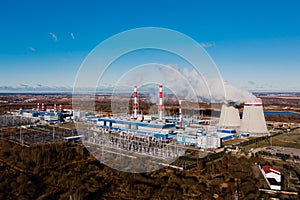 Ecology and environmental pollution. Smoking chimneys of plant, coal power plant.