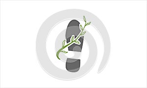 Ecology foot logo with green leaf. Vector logo design illustration