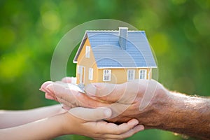 Ecology house in hands