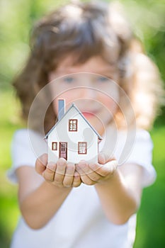 Ecology house in hands