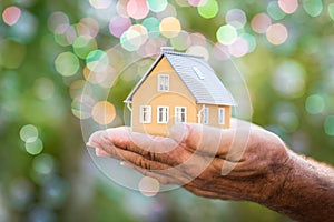 Ecology house in hands