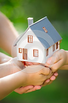 Ecology house in hands