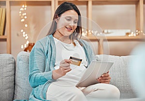 Ecommerce, credit card and pregnant woman with tablet on sofa using internet wifi connection, electronic payment and