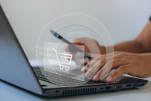 eCommerce online shopping concept. Business people using mobile smartphone and laptop computer to order in online store
