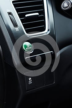 Economic green mode programme button in a modern car