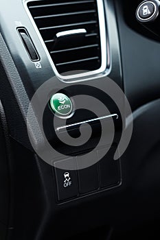 Economic green mode programme button in a modern car photo