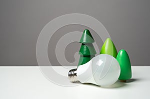 Economical LED light bulb and tree figurines.