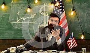 Economy and finance. Patriotism and freedom. Independence day of usa. Bearded man with dollar money for bribe. American