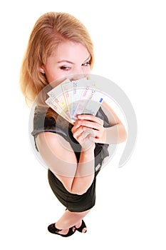 Economy finance. Woman holds euro currency money.