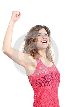 Ecstatic beautiful girl with her arm raised photo