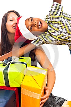 Ecstatic boy and woman celebrating Christmas