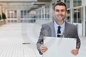 Ecstatic businessman holding a briefcase