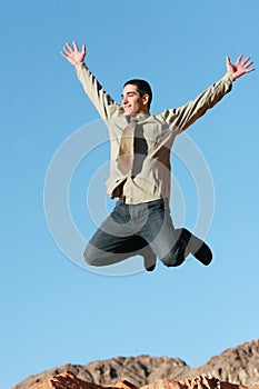 Ecstatic businessman jumping