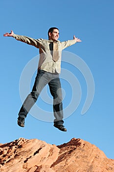 Ecstatic businessman jumping