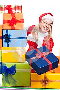 Ecstatic Christmas woman giving presents