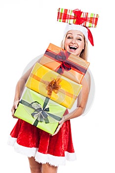 Ecstatic Christmas woman with many presents