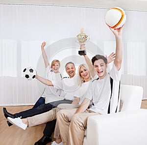 Ecstatic family celebrating a win