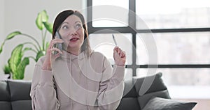 Ecstatic woman finds out pregnant using a home test and breaks the news to loved one over phone