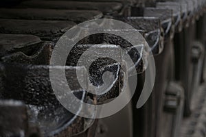 ECU higher angle detail of tread links on captured US Army tank on display in Vietnam variation