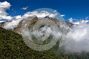 Ecuador vulcano. Pichincha volcano, clear day in the high mountain in Ecuador. Pichincha 4794 m, hill in clouds on blue sky.