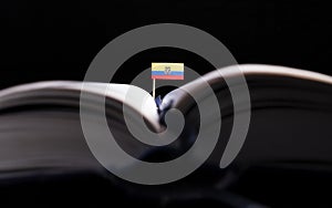 Ecuadorean flag in the middle of the book. photo